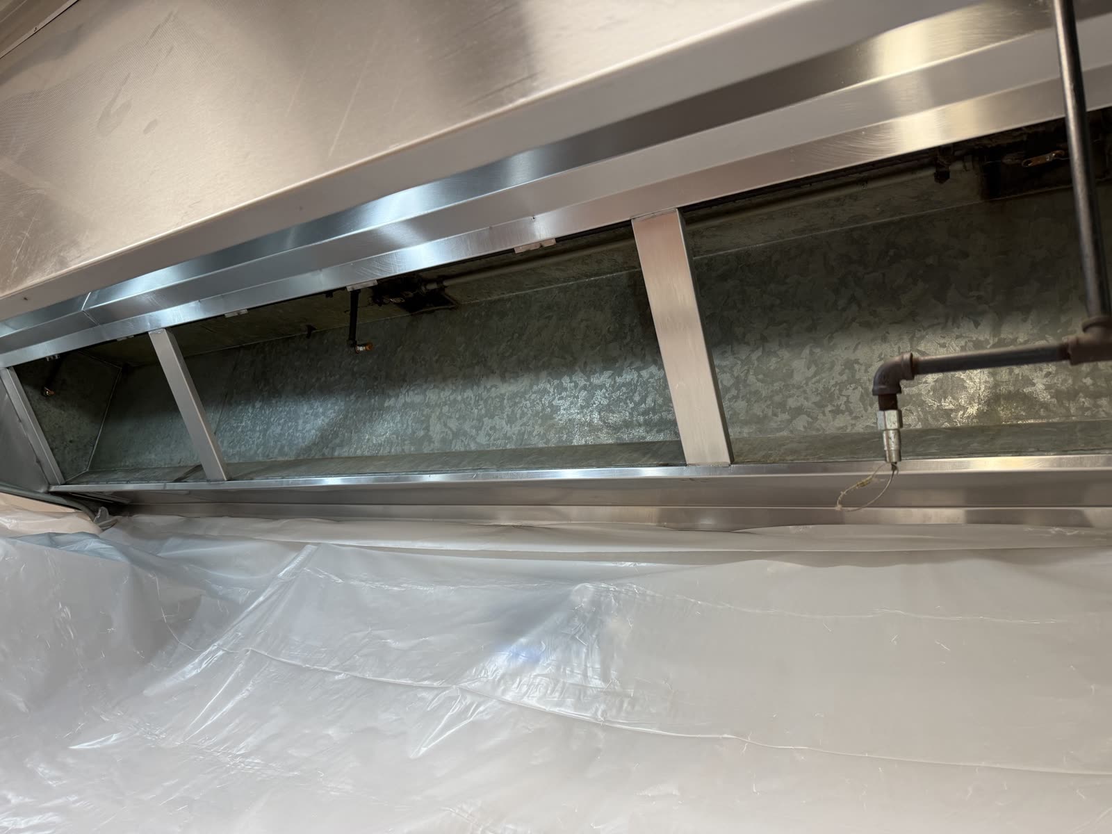 Clean hood plenum after a La Hacienda job